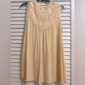 Light yellow sleeveless tunic